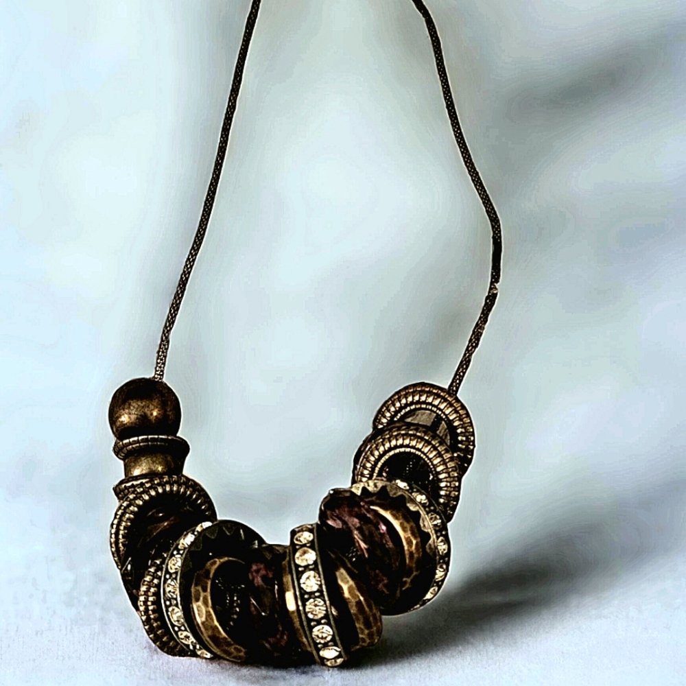 Chunky necklace with embellishments.